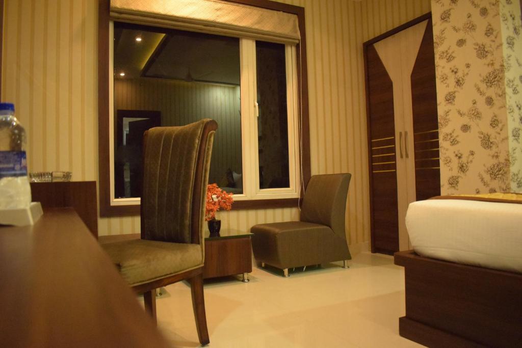 Posezení v ubytování Hotel Uday Palace