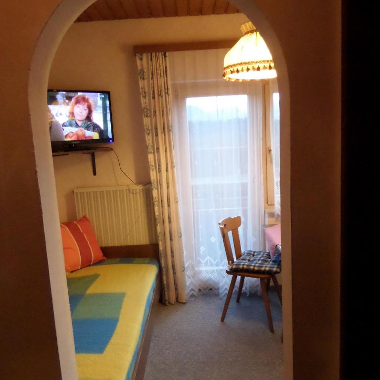 TV a/nebo společenská místnost v ubytování Gästehaus ERLE