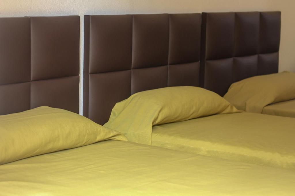 Postel nebo postele na pokoji v ubytování Hostal Esperanza