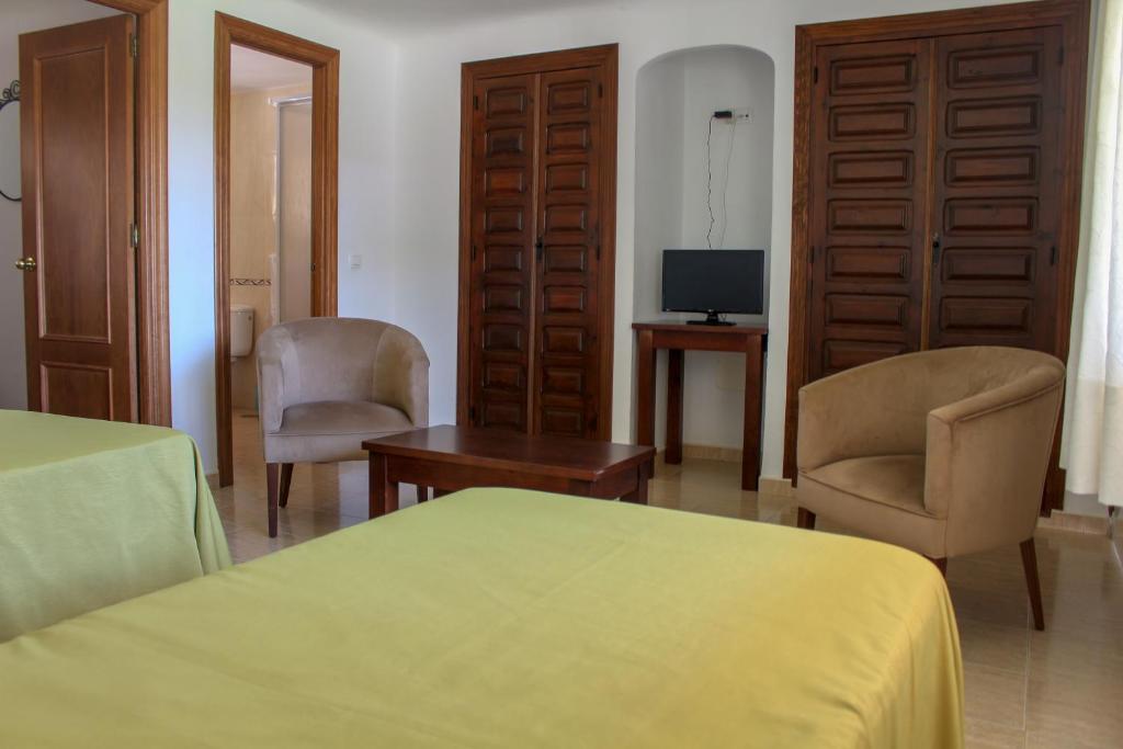 TV a/nebo společenská místnost v ubytování Hostal Esperanza