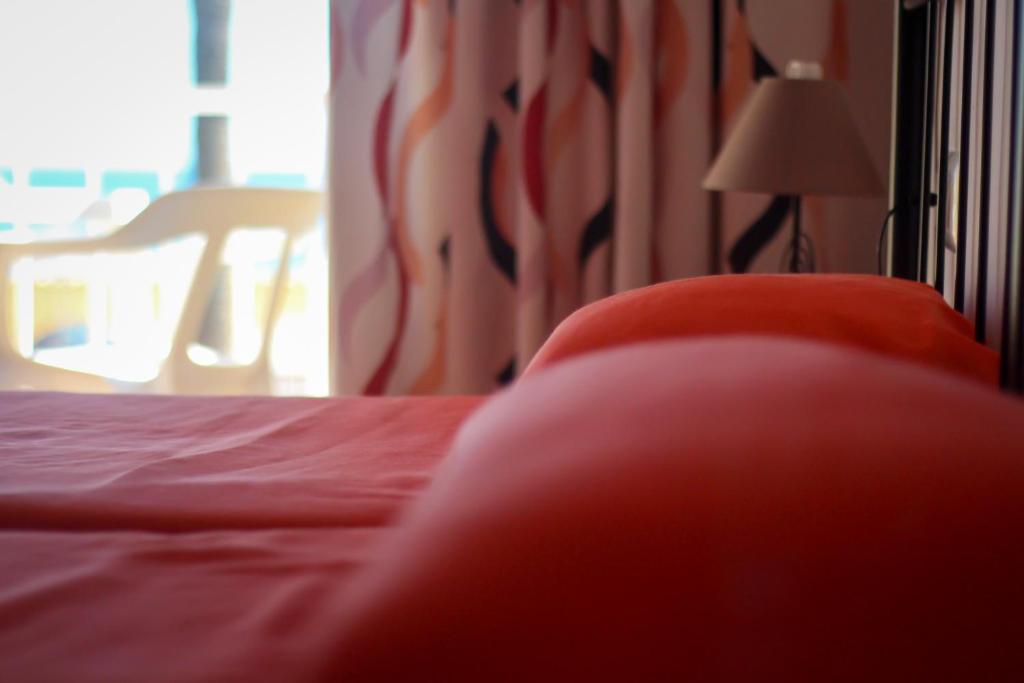 Postel nebo postele na pokoji v ubytování Hostal Esperanza