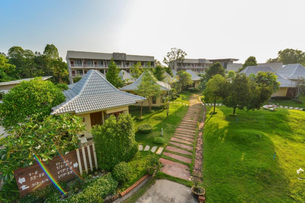 an overhead view of a park with houses and trees at Panlaan Boutique Resort in Nong Khai