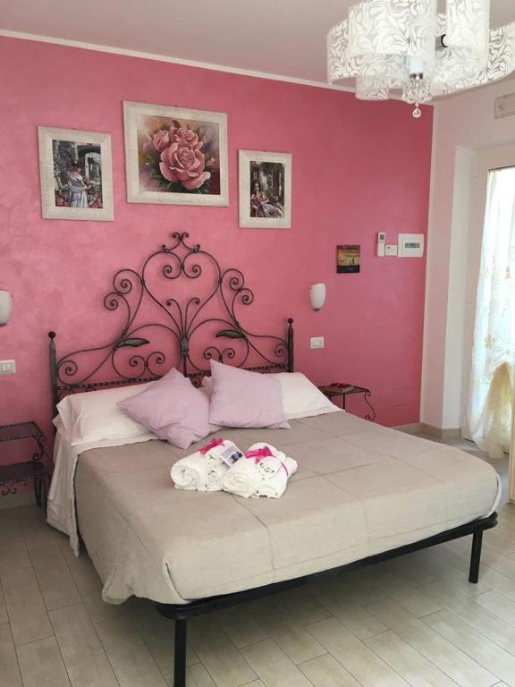 Postel nebo postele na pokoji v ubytování Giglio Del Conero