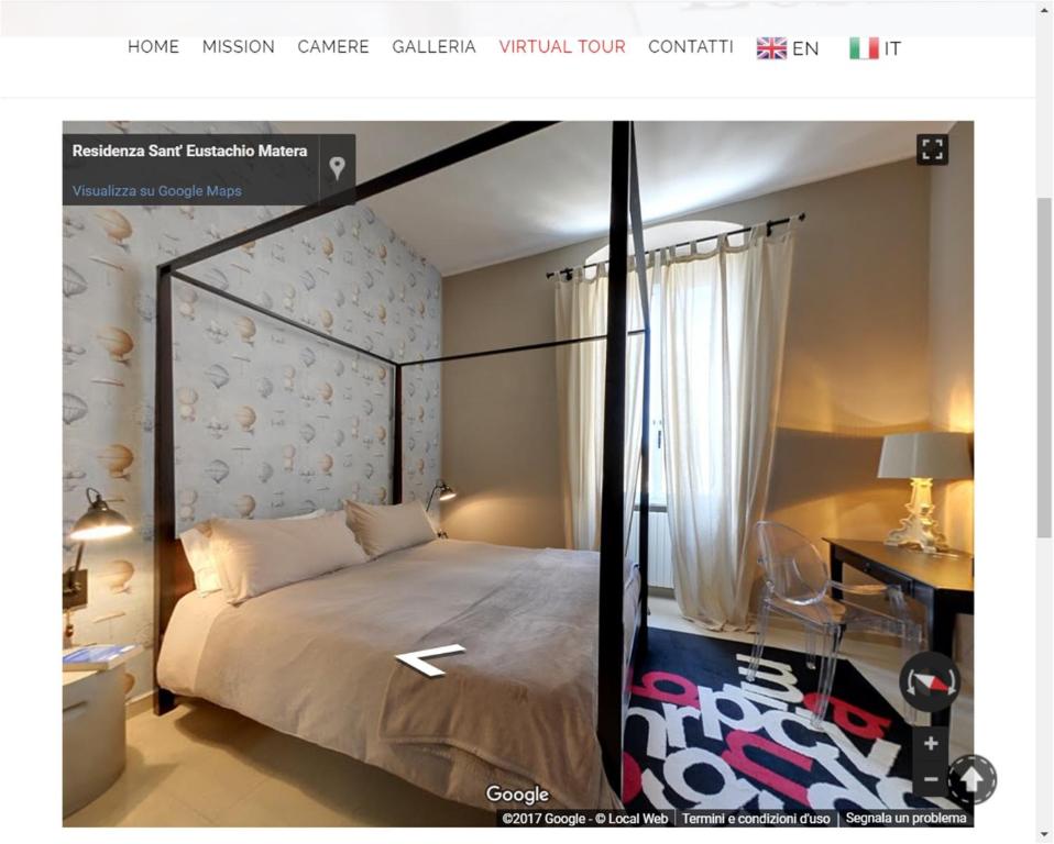 マテーラにあるResidenza Sant'Eustachioのベッドルーム1室(ベッド1台、デスク付)