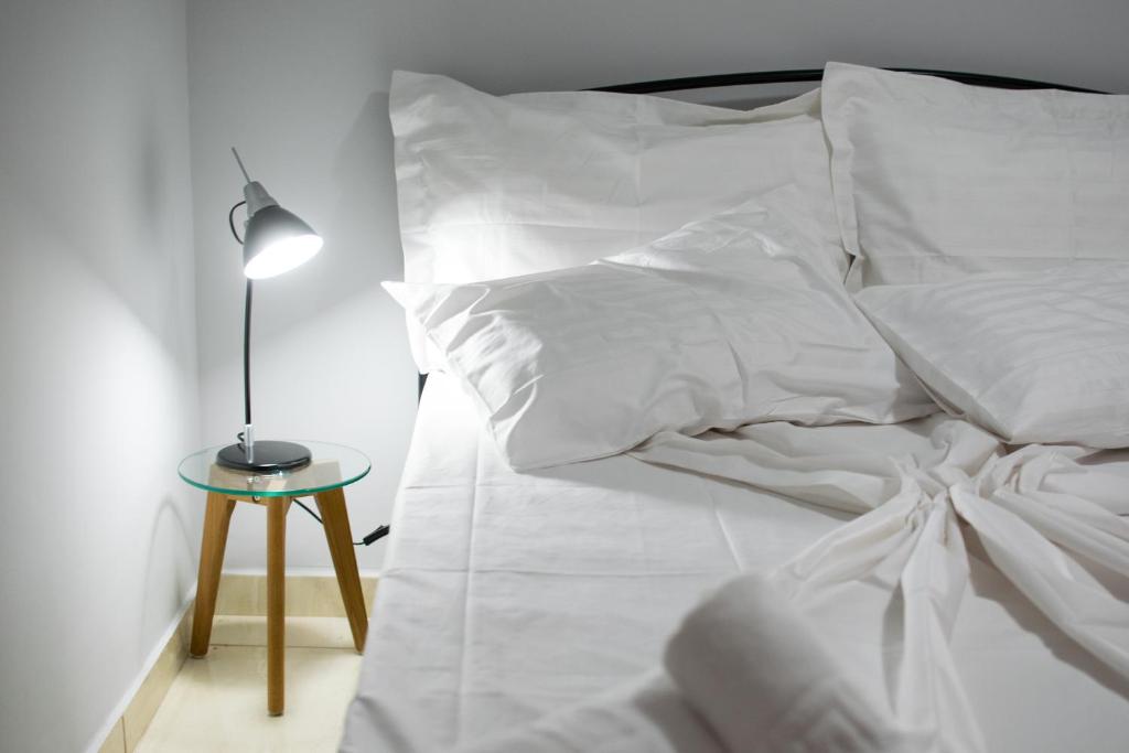 A bed or beds in a room at FINIKAS House