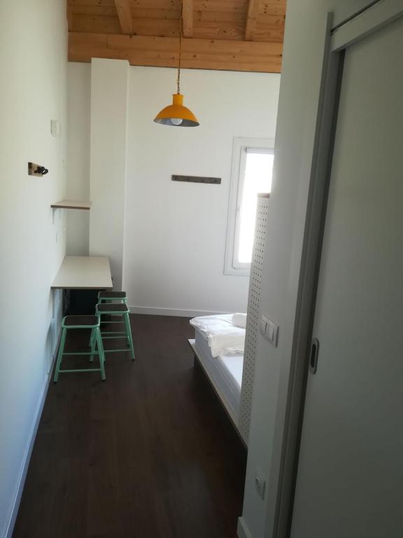 Postel nebo postele na pokoji v ubytování Agora Hostel