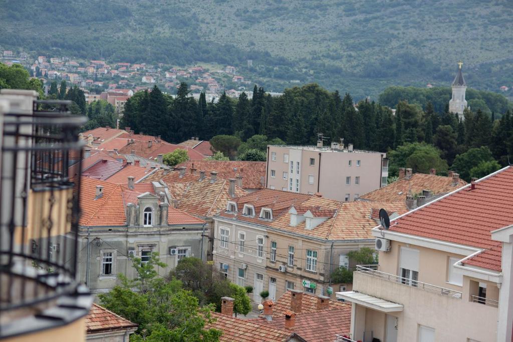 a view of a city with roofs and buildings at Bella Vista in Trebinje