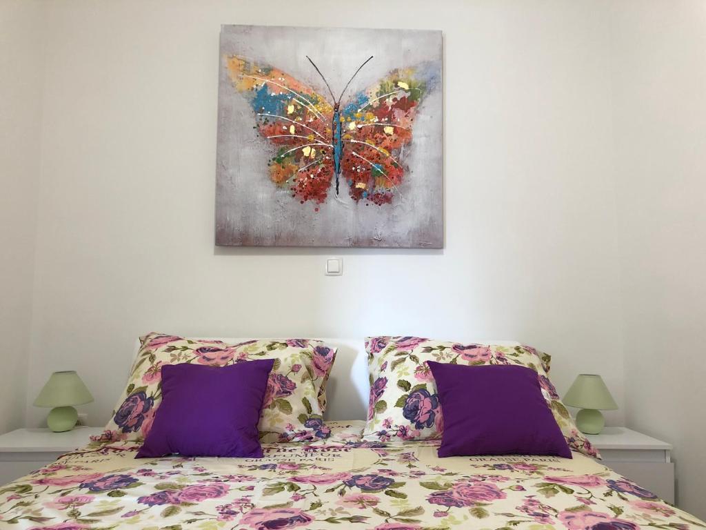Postel nebo postele na pokoji v ubytování Apartments J&K