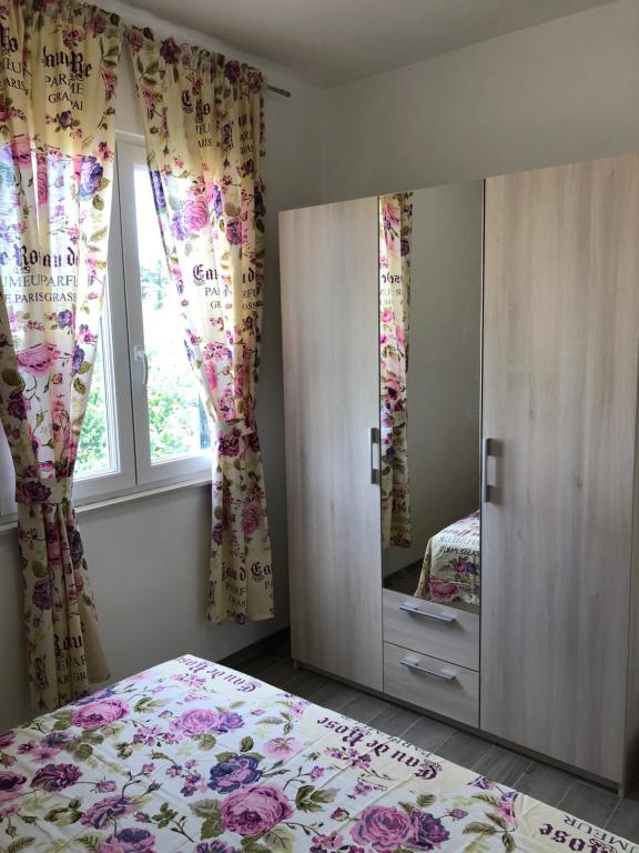 Postel nebo postele na pokoji v ubytování Apartments J&K