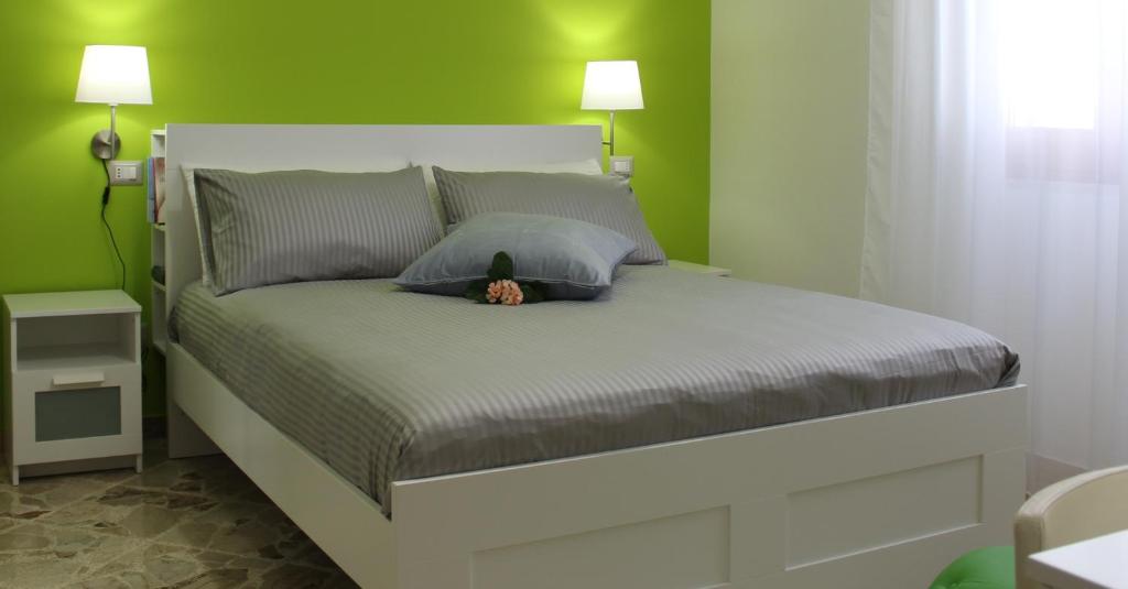 Postel nebo postele na pokoji v ubytování La Chiave Rossa B&B