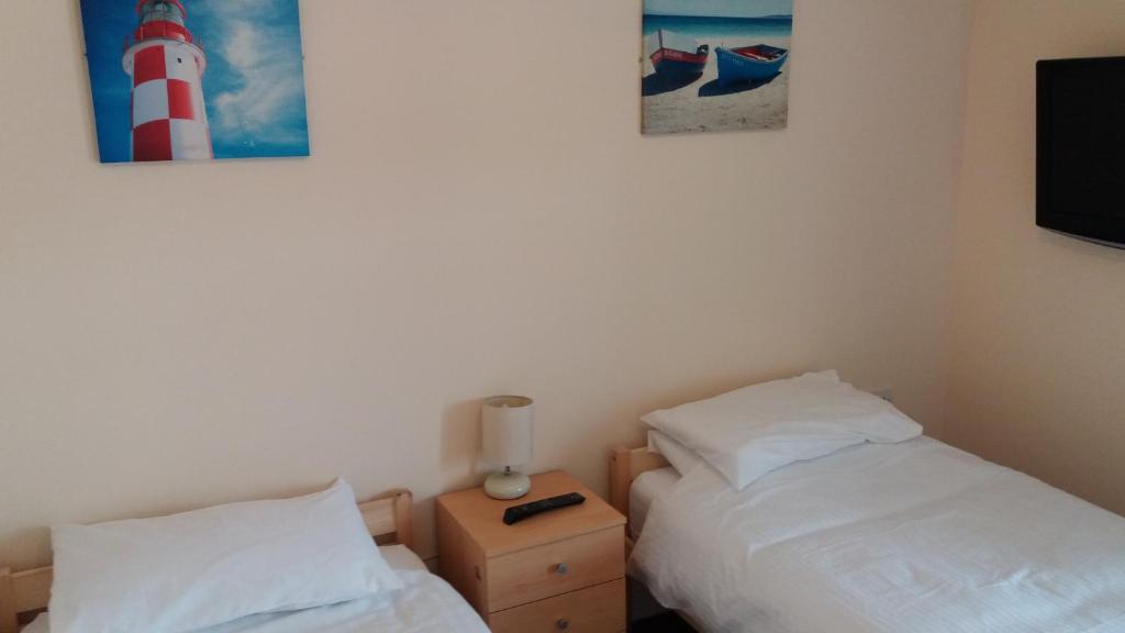 Postel nebo postele na pokoji v ubytování delamere holiday apartments