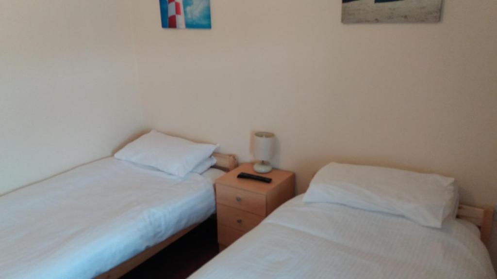 Postel nebo postele na pokoji v ubytování delamere holiday apartments