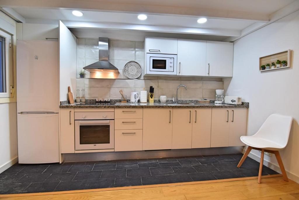 Kuchyňa alebo kuchynka v ubytovaní Apt. El Escondite, Centro Histórico