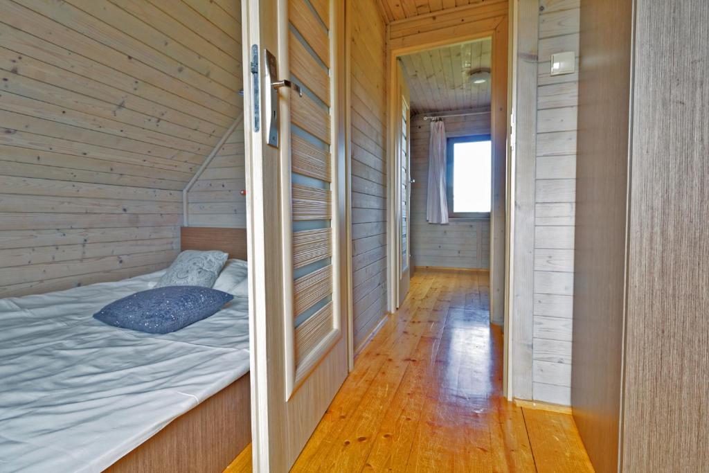 Postel nebo postele na pokoji v ubytování Domki Dominika