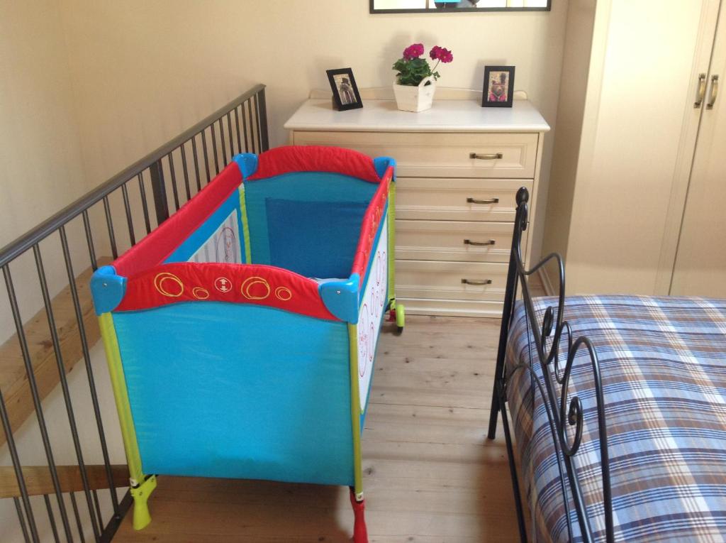 Łóżko lub łóżka w pokoju w obiekcie La Corte di Nonna Gemma - Holiday Home