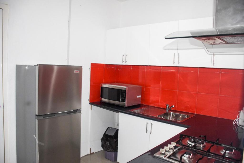 Kuchyň nebo kuchyňský kout v ubytování Best View Apartments