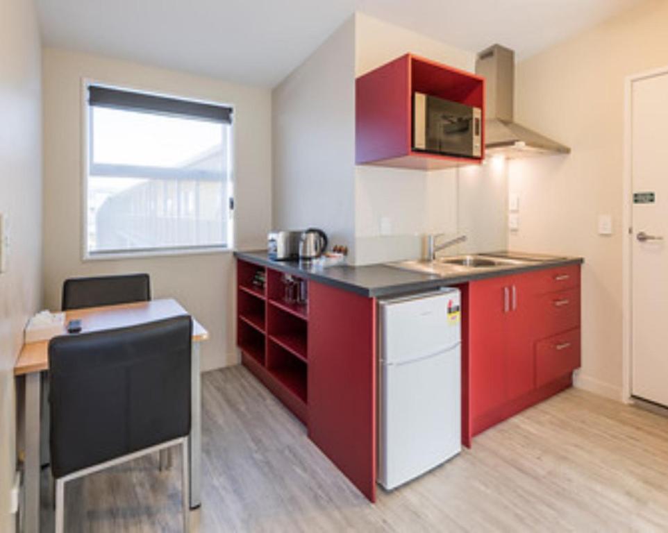 Kuchyň nebo kuchyňský kout v ubytování C-Motel