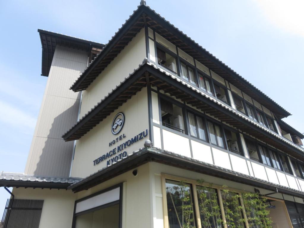 a building with a sign on the front of it at Terrace Kiyomizu Kyoto in Kyoto