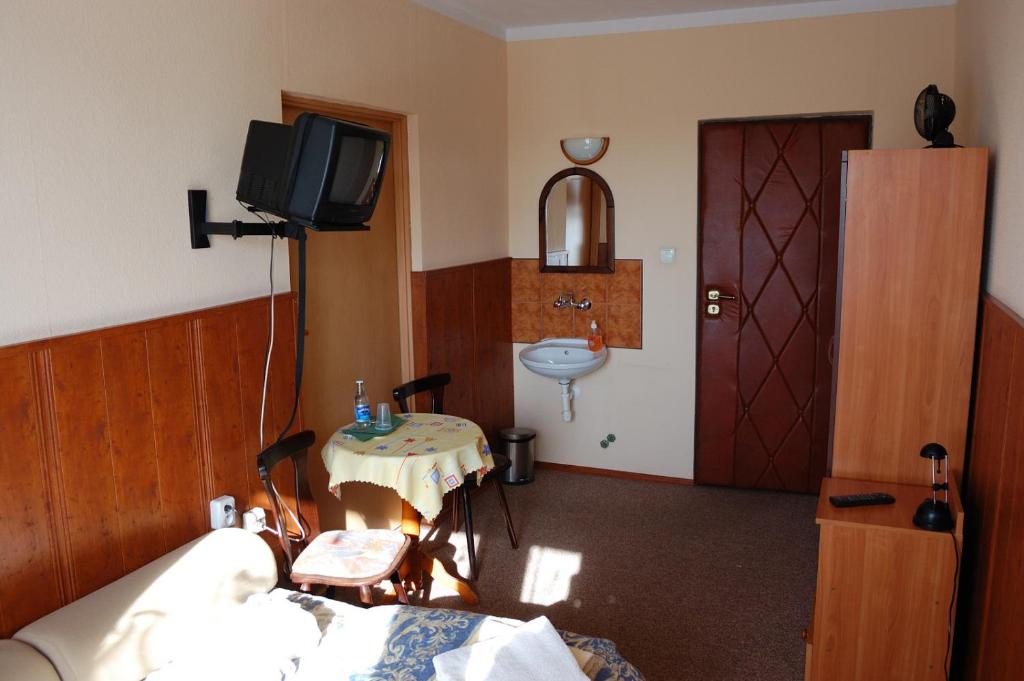 Posteľ alebo postele v izbe v ubytovaní Hotel Bona