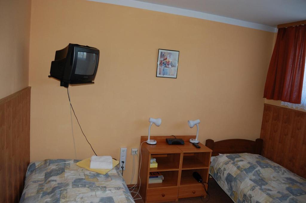 Posteľ alebo postele v izbe v ubytovaní Hotel Bona