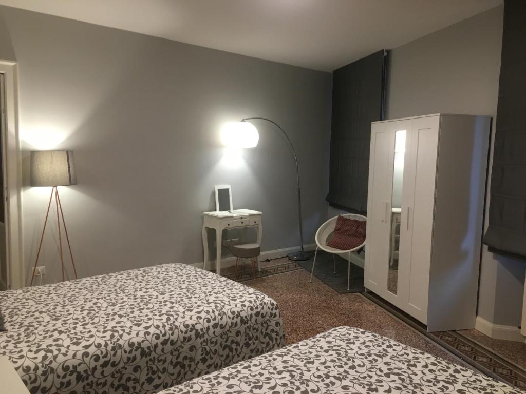 Łóżko lub łóżka w pokoju w obiekcie Casa Mauri