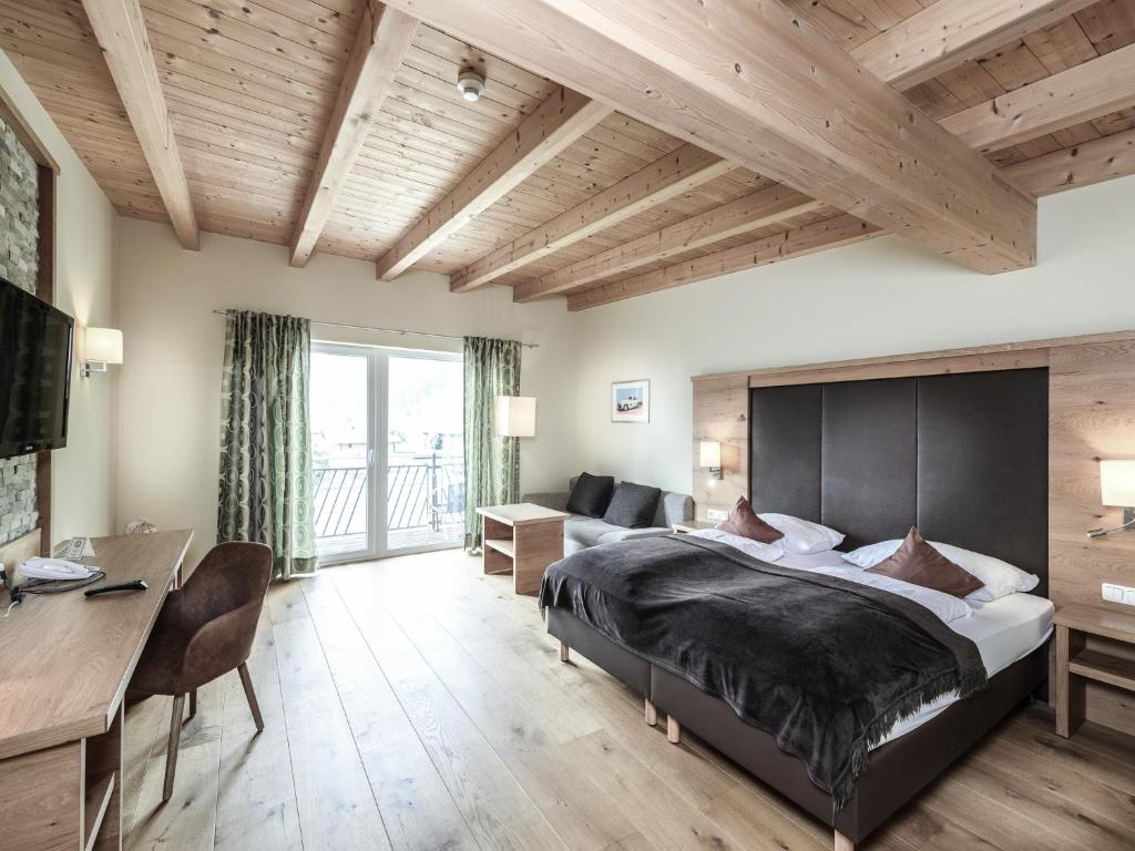 Postel nebo postele na pokoji v ubytování Hotel Victoria