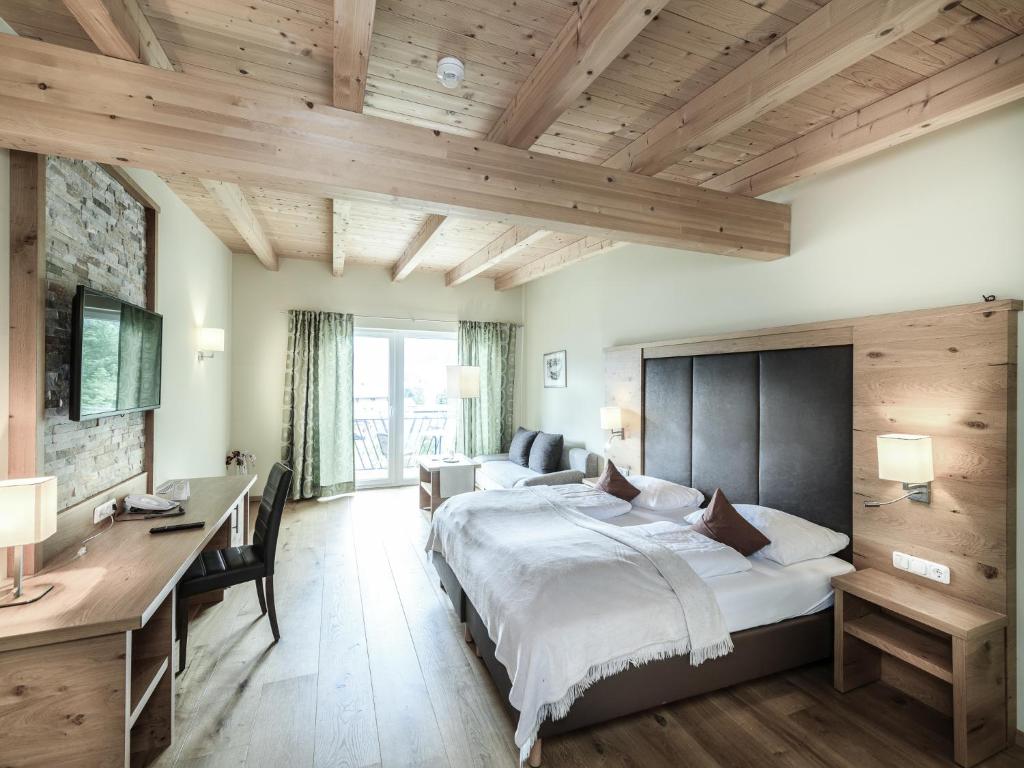 Postel nebo postele na pokoji v ubytování Hotel Victoria