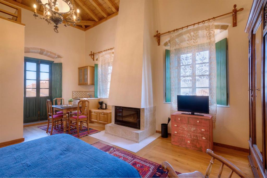 TV a/nebo společenská místnost v ubytování Ritsos Guesthouse