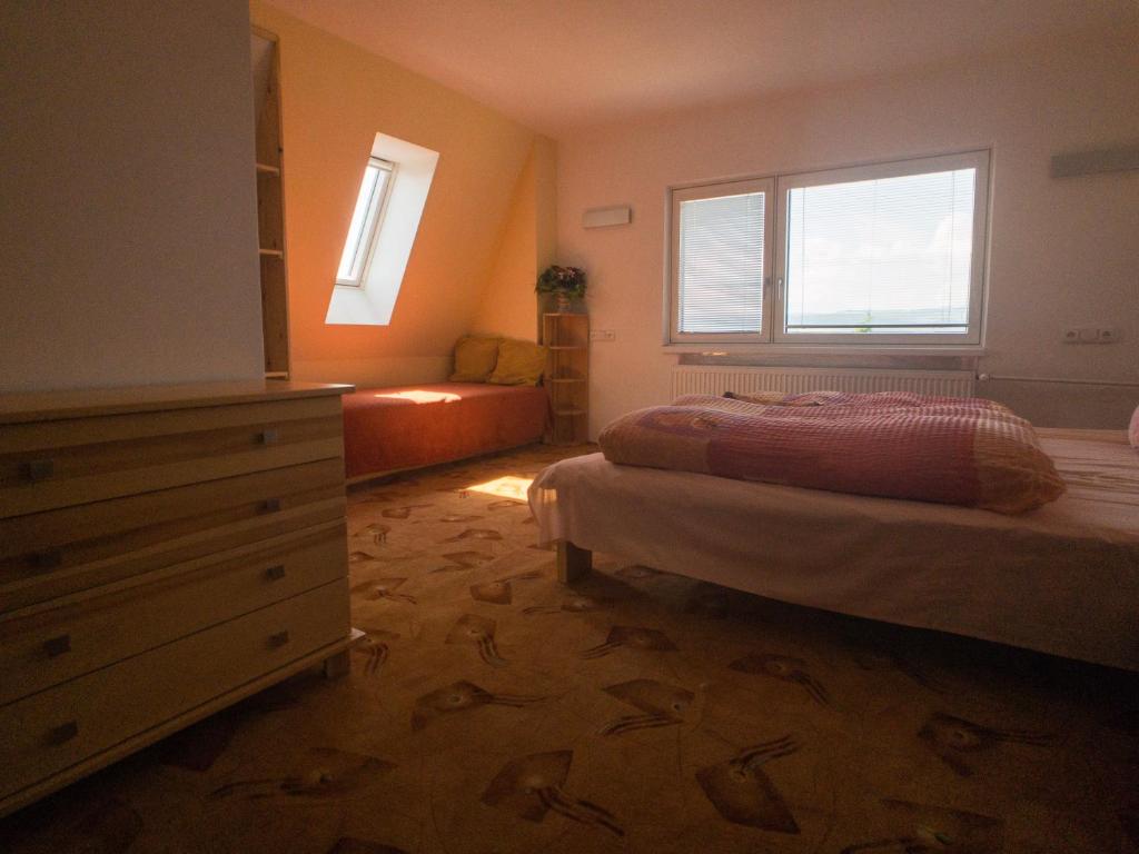 Postel nebo postele na pokoji v ubytování Guest House Privát Štrba