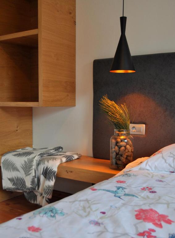 Postel nebo postele na pokoji v ubytování Apartments ALPA VITA