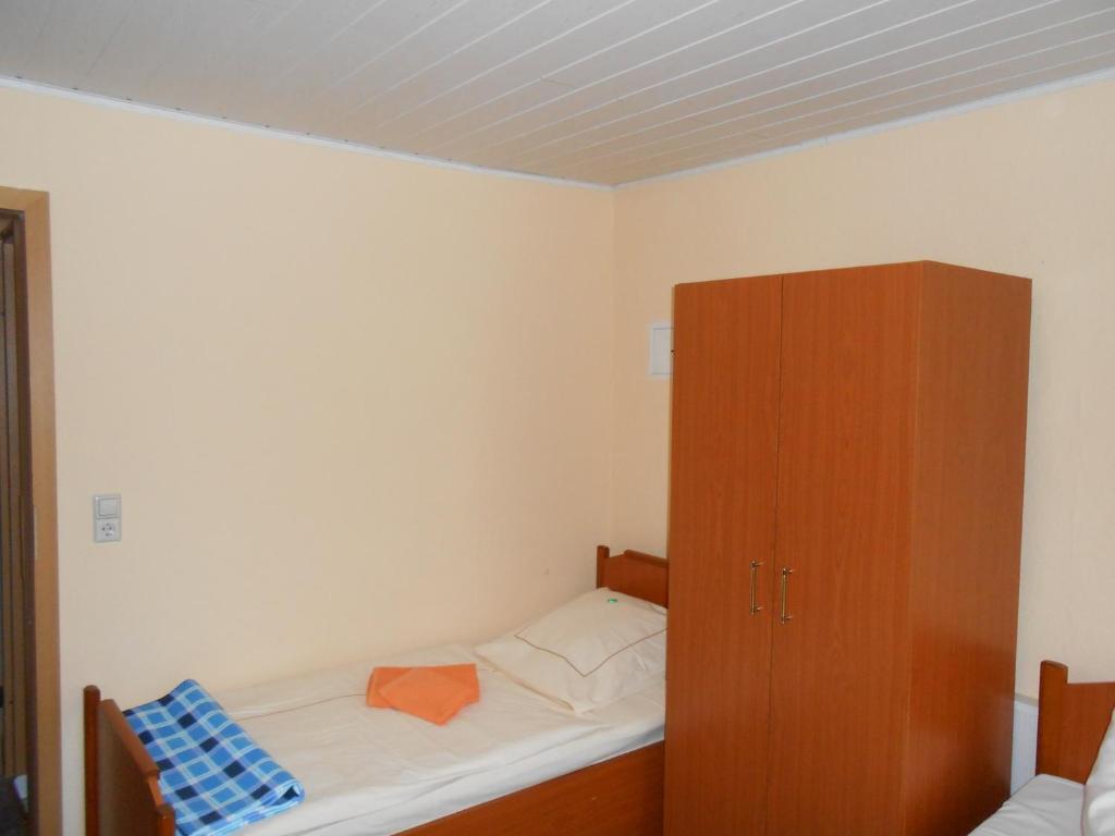Postel nebo postele na pokoji v ubytování Goldener Engel /Pension