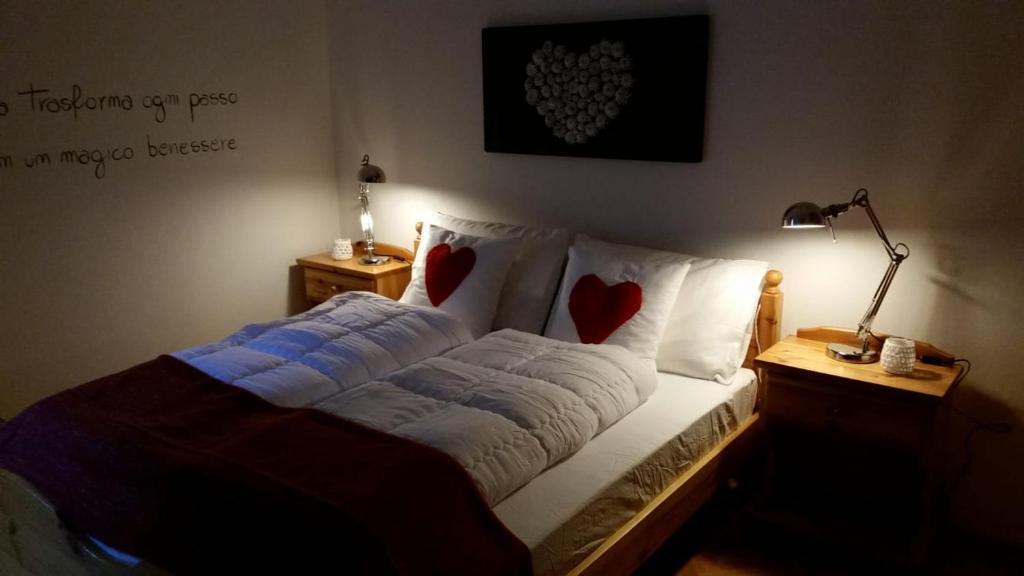 Postel nebo postele na pokoji v ubytování il bosco in casa