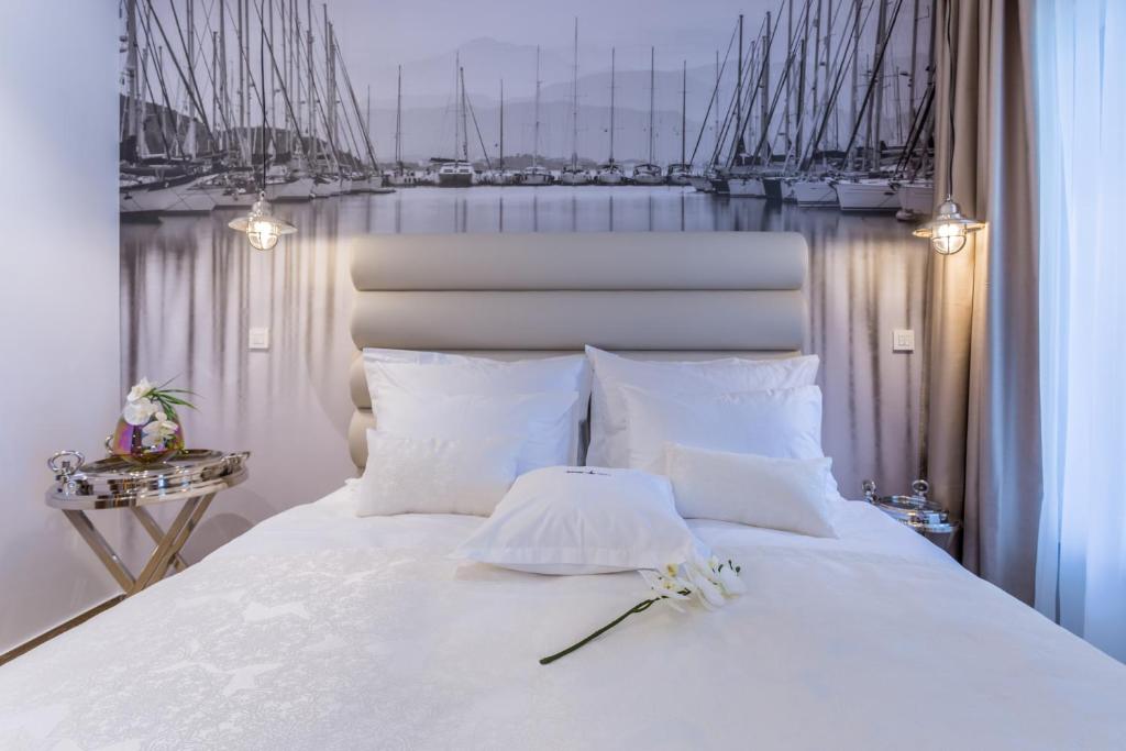 Кровать или кровати в номере Apartments Marina Novi