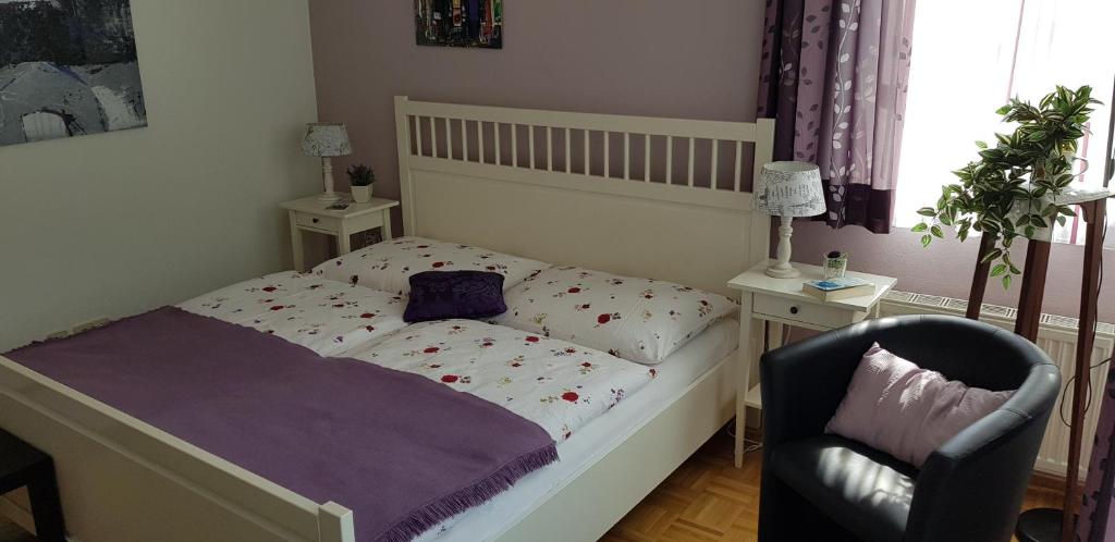Voodi või voodid majutusasutuse Gästehaus Landgraf toas