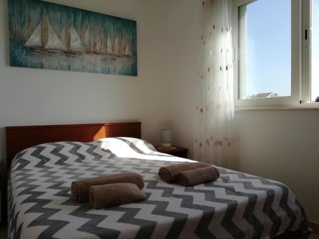 Posteľ alebo postele v izbe v ubytovaní Apartment Ivo Mazic