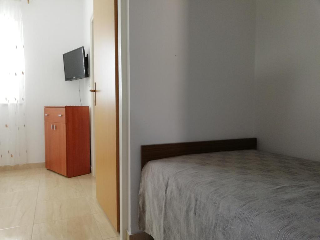 Posteľ alebo postele v izbe v ubytovaní Apartment Ivo Mazic