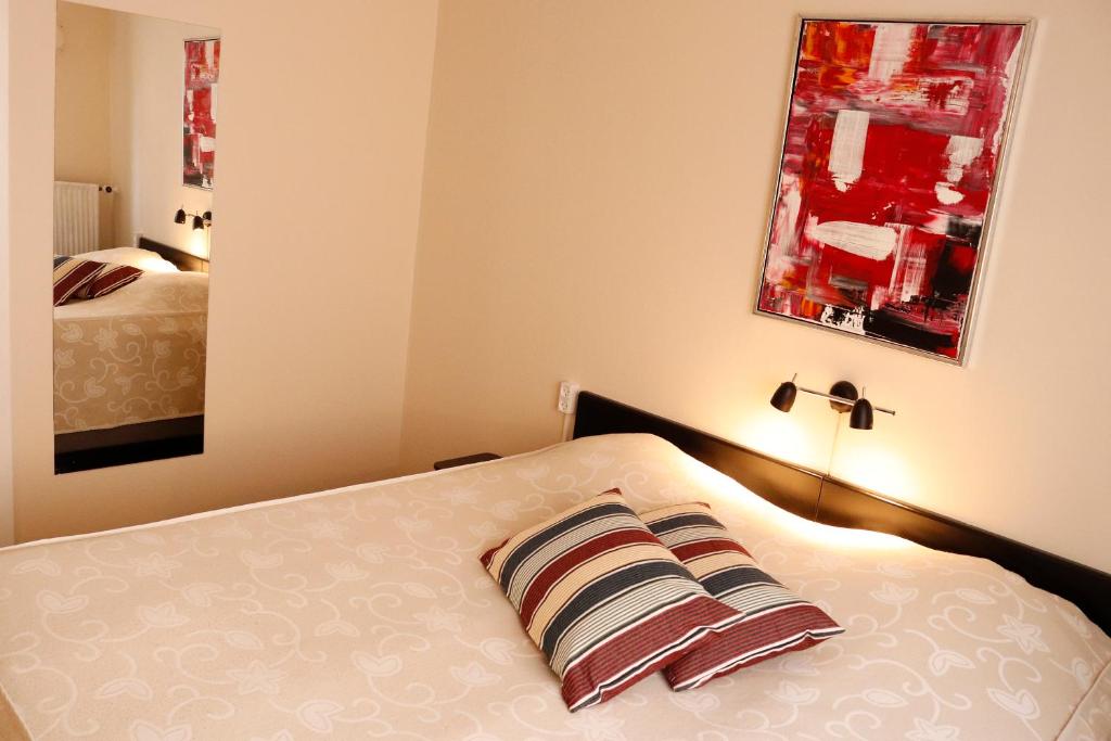 Postel nebo postele na pokoji v ubytování Taastrup Park Hotel