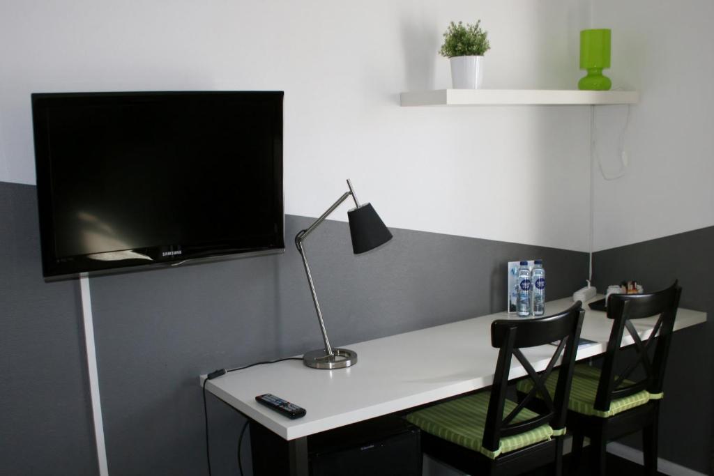 TV a/nebo společenská místnost v ubytování Taastrup Park Hotel