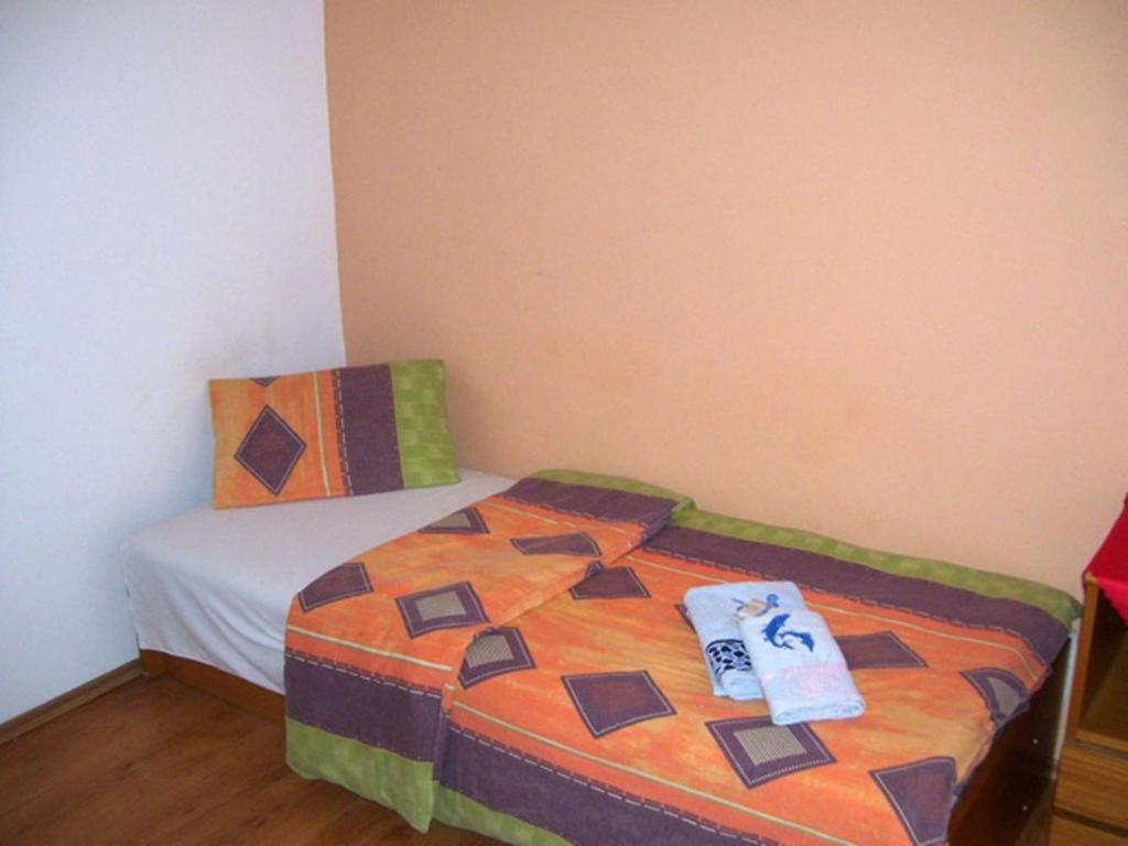 Postel nebo postele na pokoji v ubytování Hotel Slovan