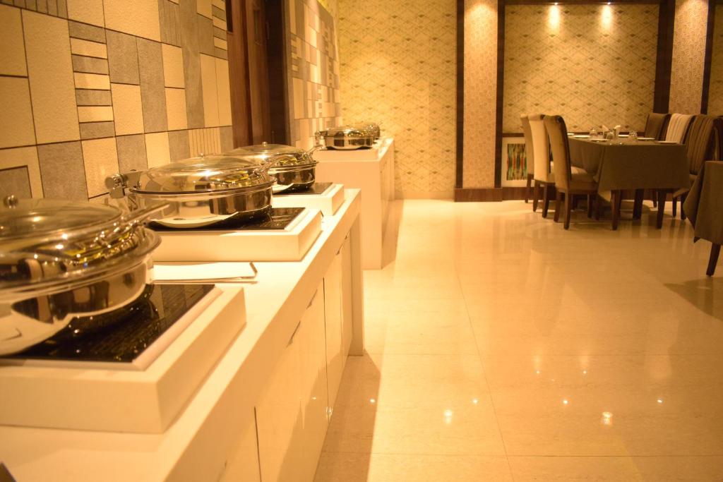 Kuchyň nebo kuchyňský kout v ubytování Hotel Uday Palace