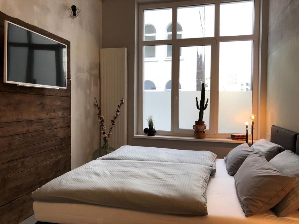 OLD PRINTING HOUSE - Modern I City I 2 Min HBF I E-Ladesäule - Resim 31