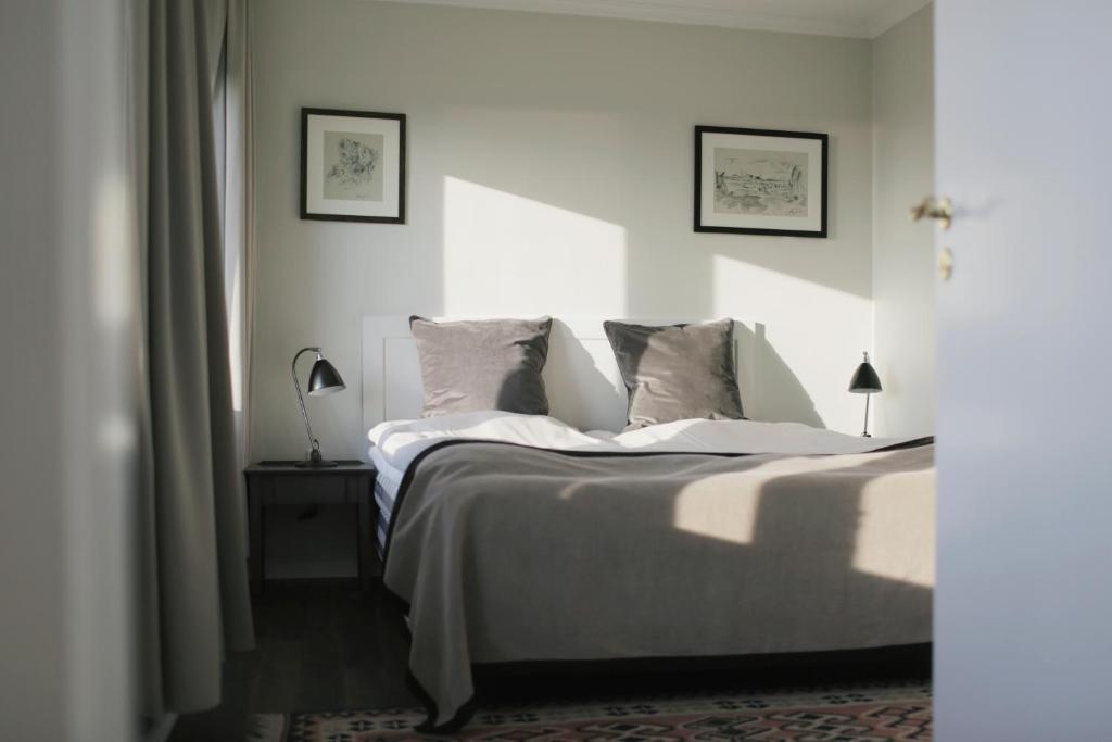 Postel nebo postele na pokoji v ubytování Skovshoved Hotel