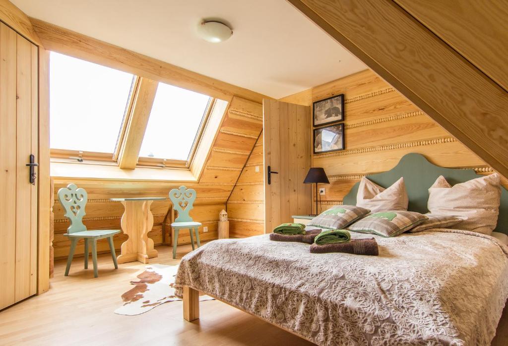 Posteľ alebo postele v izbe v ubytovaní Apartament Gawra Zakopane