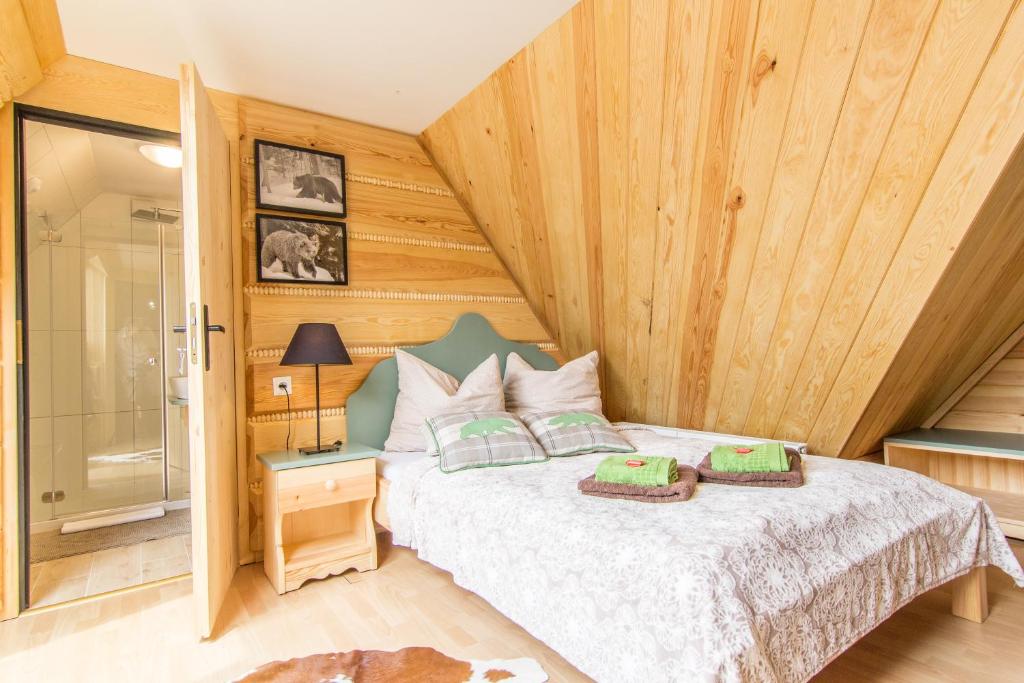 Posteľ alebo postele v izbe v ubytovaní Apartament Gawra Zakopane