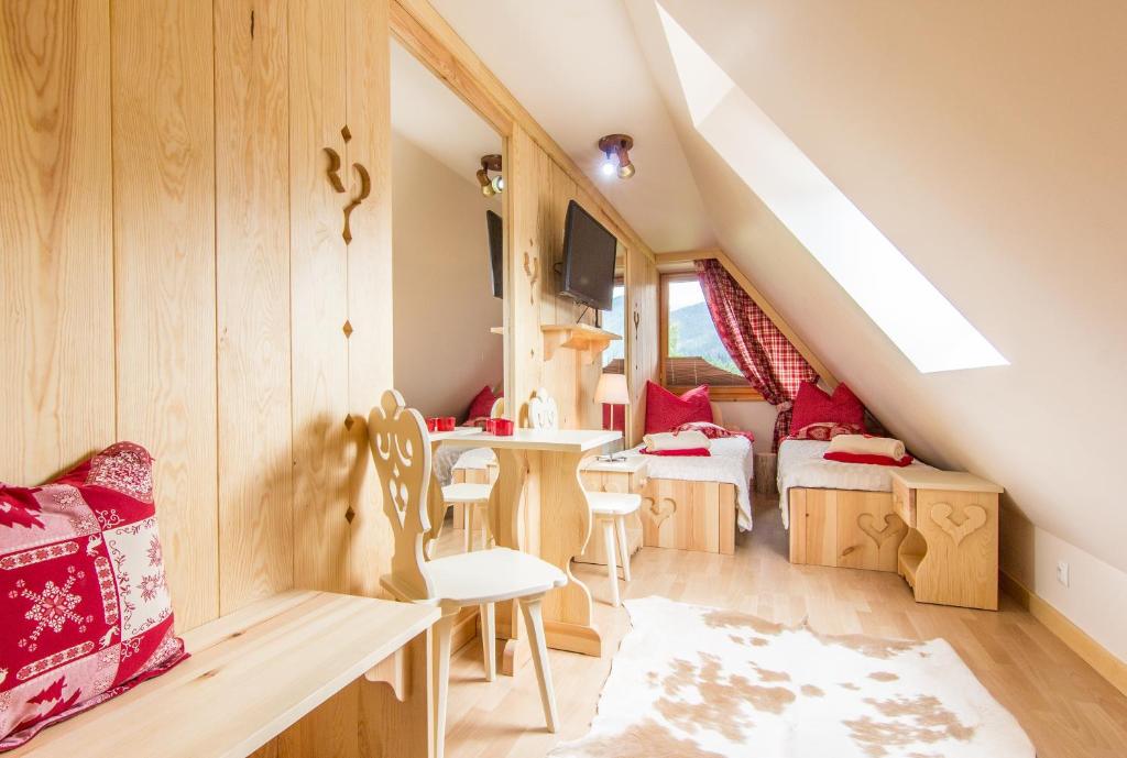 Posteľ alebo postele v izbe v ubytovaní Apartament Gawra Zakopane