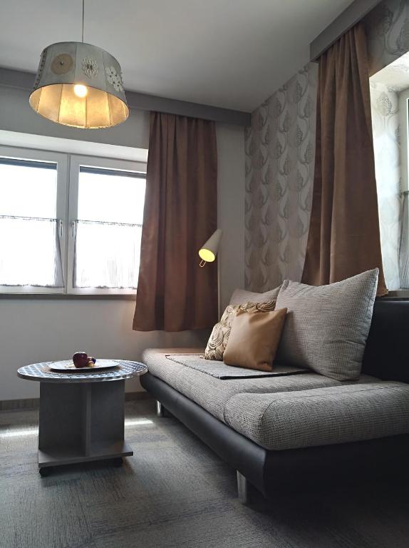Posedenie v ubytovaní Business Apartments