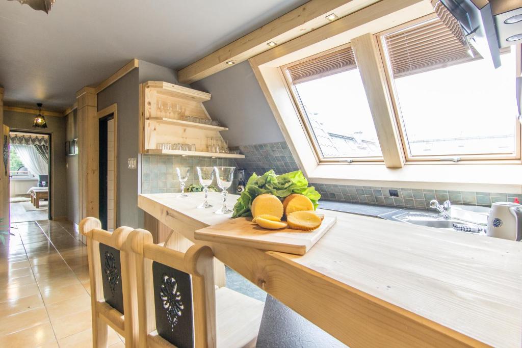 Kuchyňa alebo kuchynka v ubytovaní Apartament Gawra Zakopane