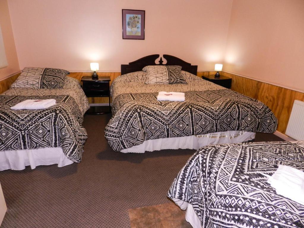 Cama o camas de una habitación en Hotel Don Matías