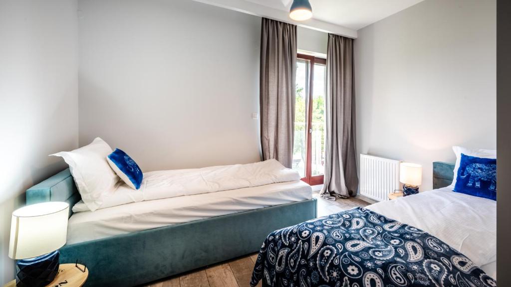 Posteľ alebo postele v izbe v ubytovaní A11 Apartments & SPA Dermique