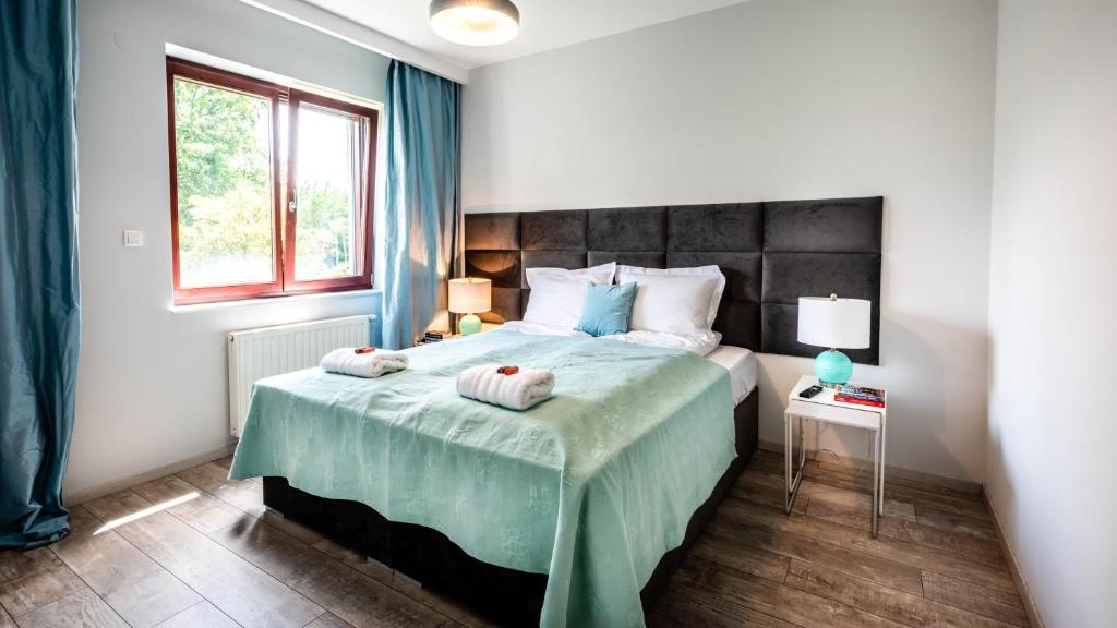 Posteľ alebo postele v izbe v ubytovaní A11 Apartments & SPA Dermique